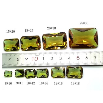 أحجار متغيرة اللون من أحجار الزولتانيت على شكل كمثرى