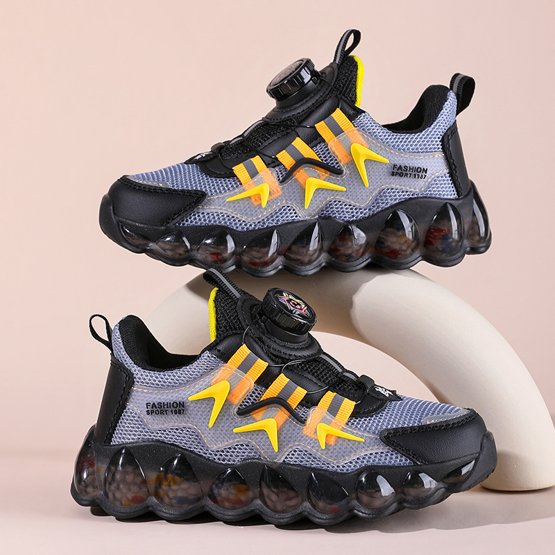 الأحذية الرياضية للأولاد لفصل الربيع الجديد عبر الحدود أحذية شبكية أحذية زر التنفس أحذية طلاب المدارس الابتدائية