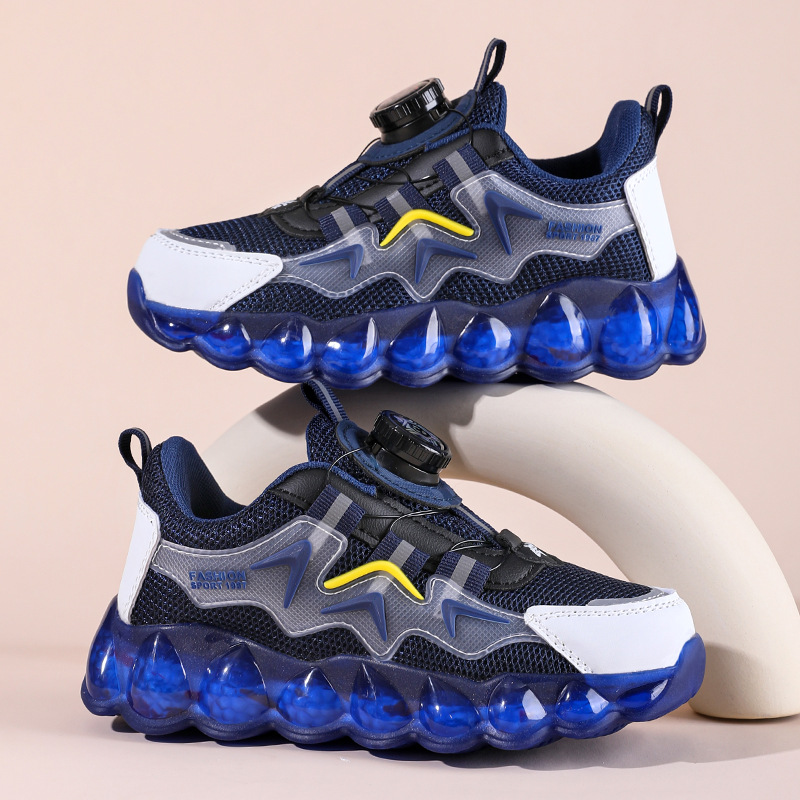 الأحذية الرياضية للأولاد لفصل الربيع الجديد عبر الحدود أحذية شبكية أحذية زر التنفس أحذية طلاب المدارس الابتدائية