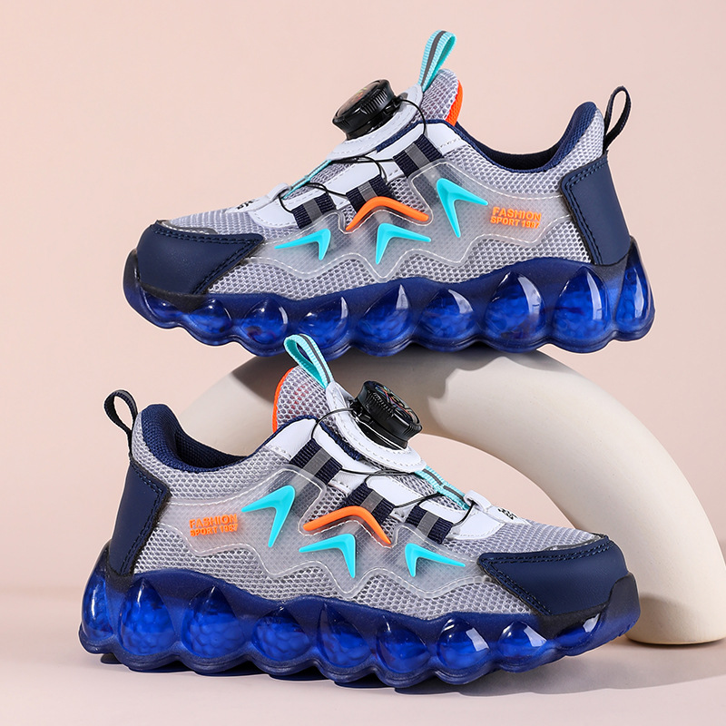 الأحذية الرياضية للأولاد لفصل الربيع الجديد عبر الحدود أحذية شبكية أحذية زر التنفس أحذية طلاب المدارس الابتدائية