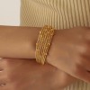 سوار متعدد الطبقات مطلب بالذهب الحقيقي عيار 18K سوار متعدد الطبقات مطلب بالذهب الحقيقي عيار 18K