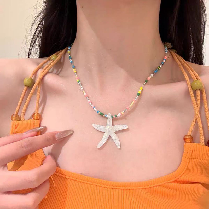 زن الصينية الجديدة قلادة من النحاس ريشة البوهيمي الرياح الوطنية للمرأة طبقة مزدوجة مطوية طويلة سترة سلسلة التبعي