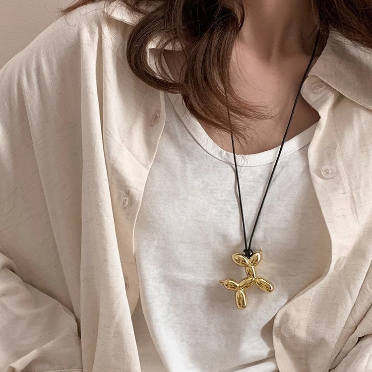 زن الصينية الجديدة قلادة من النحاس ريشة البوهيمي الرياح الوطنية للمرأة طبقة مزدوجة مطوية طويلة سترة سلسلة التبعي