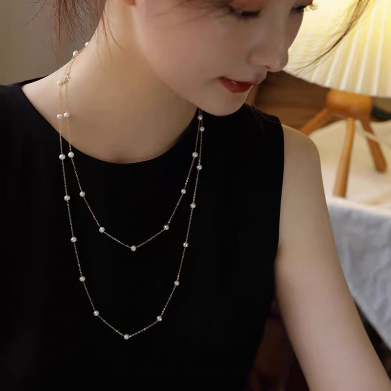 زن الصينية الجديدة قلادة من النحاس ريشة البوهيمي الرياح الوطنية للمرأة طبقة مزدوجة مطوية طويلة سترة سلسلة التبعي