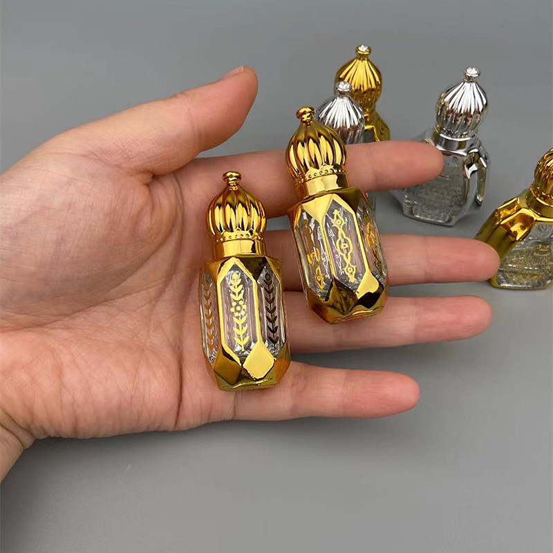 كرة تعبئة العطور الفرعية زجاجة زيت جوهر زجاجية عالية الجودة خرزة محمولة زجاجة فارغة رائعة صغيرة زجاجة عطر برونزية فرعية