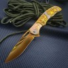 Outdoor Embossed Steel Handle Folding Knife Creative Color Titanium Wolf Head Tactical Knife Portable High Hardness Stainless Steel Fruit Knife