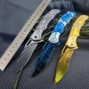 Outdoor Embossed Steel Handle Folding Knife Creative Color Titanium Wolf Head Tactical Knife Portable High Hardness Stainless Steel Fruit Knife
