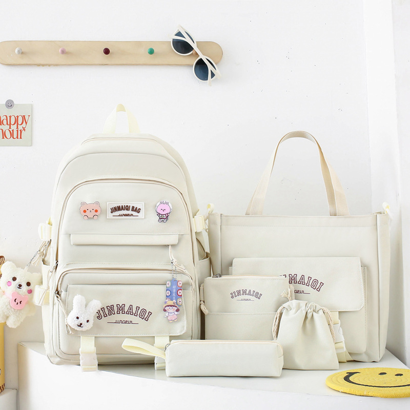 اليابانية هاراجوكو نمط المدرسة الابتدائية طالب حقيبة الظهر النسخة الكورية الجديدة عطلة نهاية الأسبوع طالب تعليم حقيبة كبيرة السعة خمس قطع مجموعة حقيبة الظهر